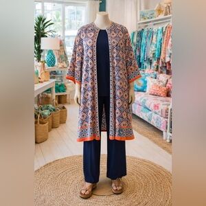 Women's Multicolor Patterned open front smock cape.
